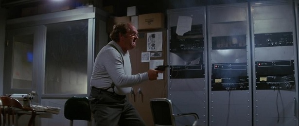 Blair shoots a pistol in John Carpenter's The Thing.