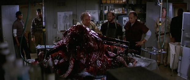 Blair examines the frozen remains of the ancient alien in John Carpenter's The Thing.