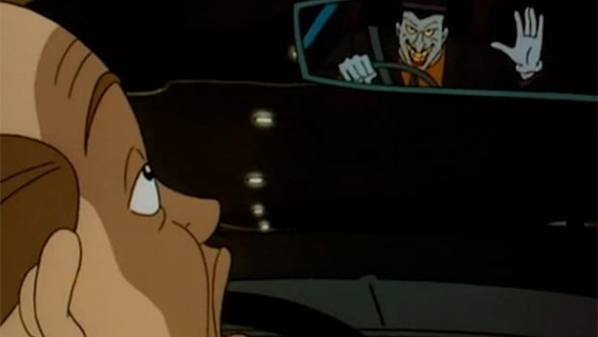 Joker waves from a car