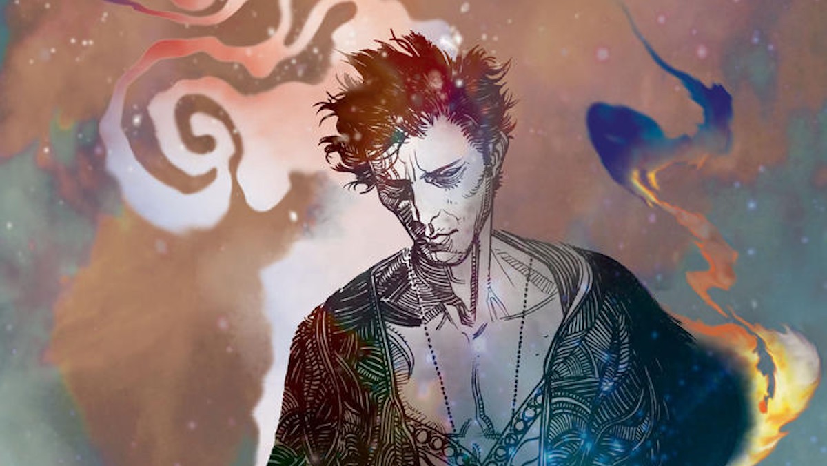 A swilring colorful background frames a melancholy Dream from The Sandman comic