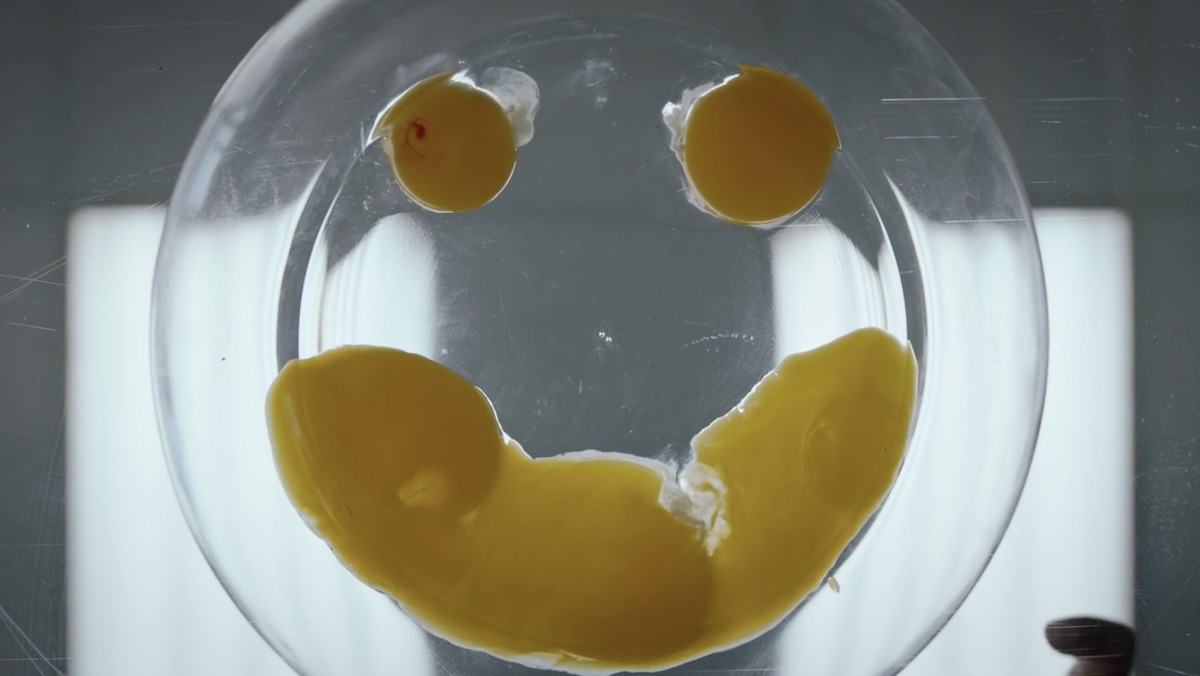 Watchmen premiere egg yolk smiley face