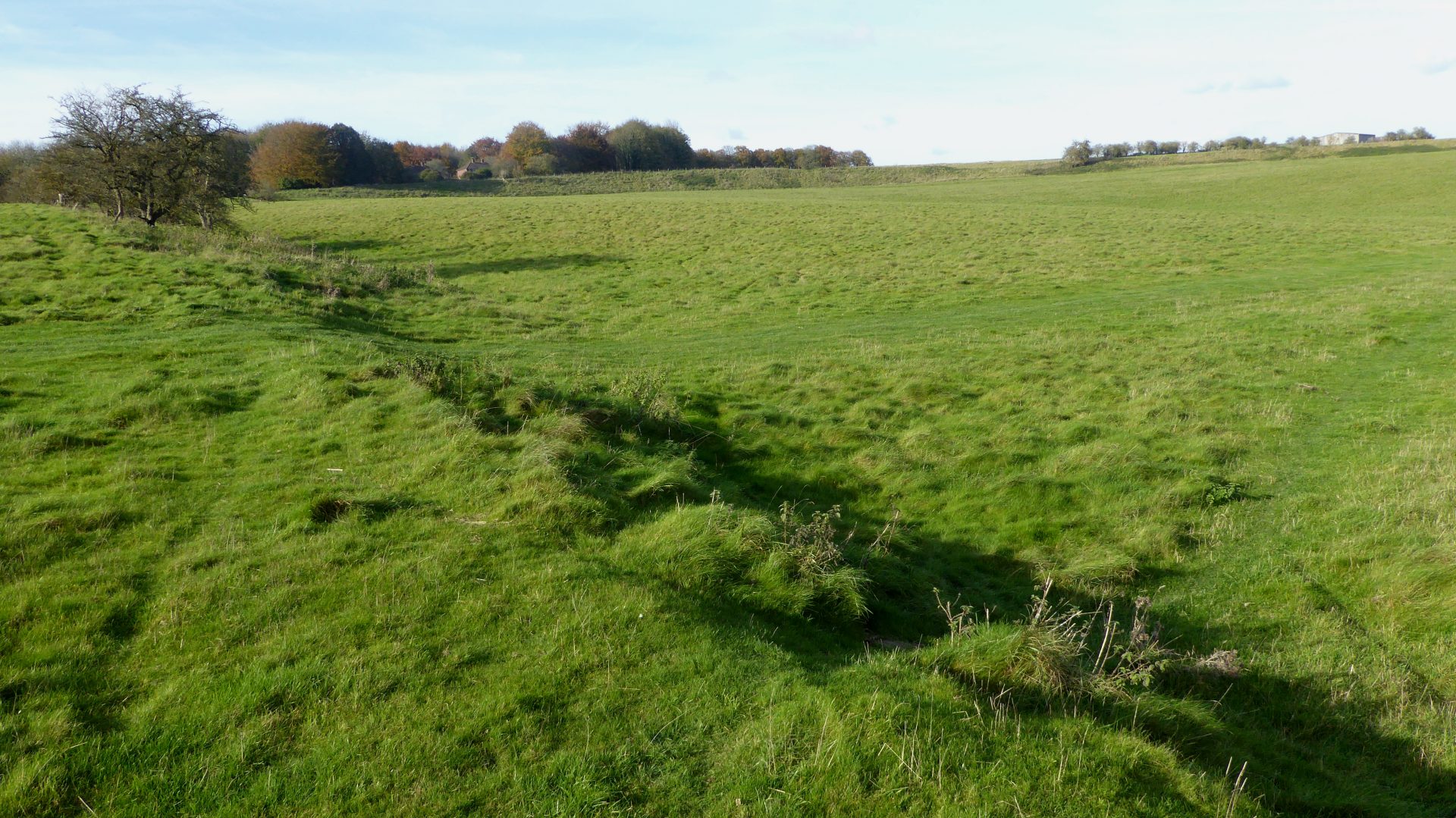 Archaeologists have discovered a 1.2-mile-wide ring of pits near Stonehenge.