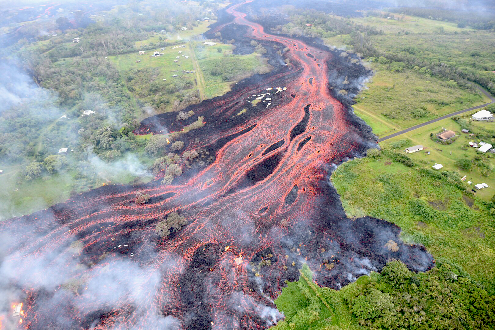 This video of a fast-moving lava flow is a reminder that you can't outrun lava flows.