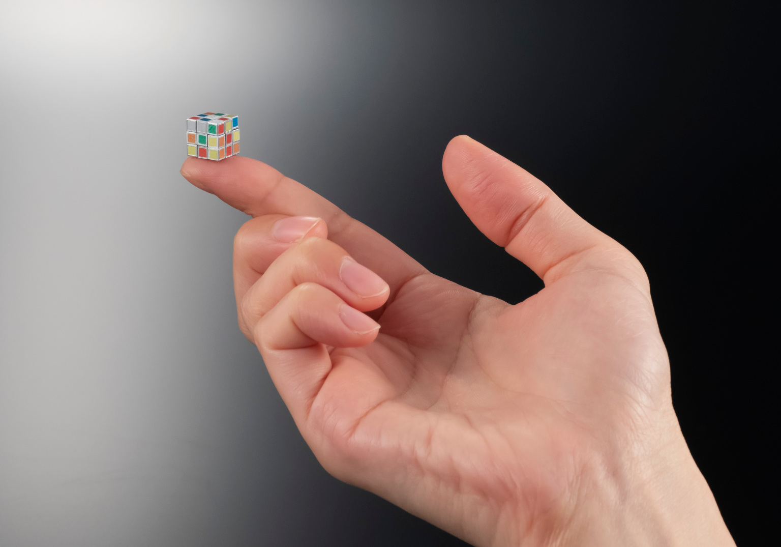 A Japanese toy company has come out with the smallest-ever official Rubik's Cube.