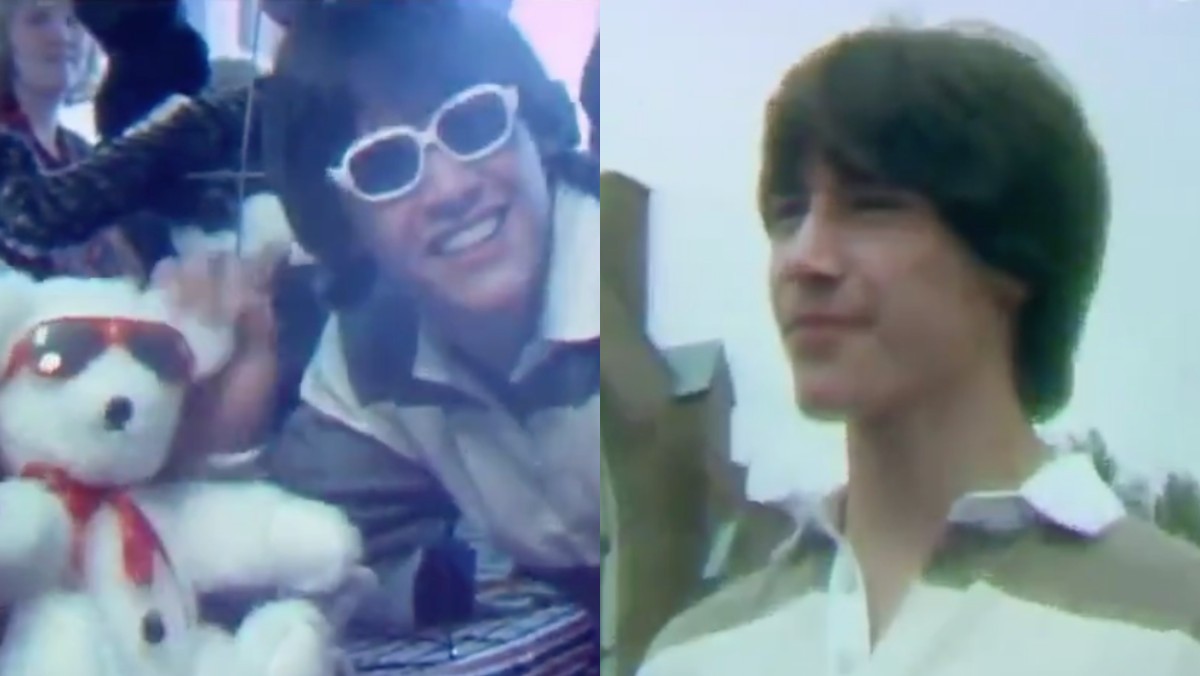 Keanu Reeves poses with a teddy bear in a clip from the CBC.