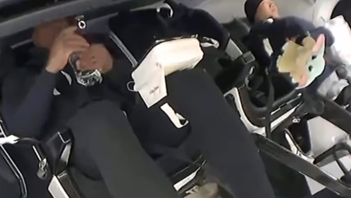 A Baby Yoda plush is seen floating through the cabin of the SpaceX Crew Dragon.