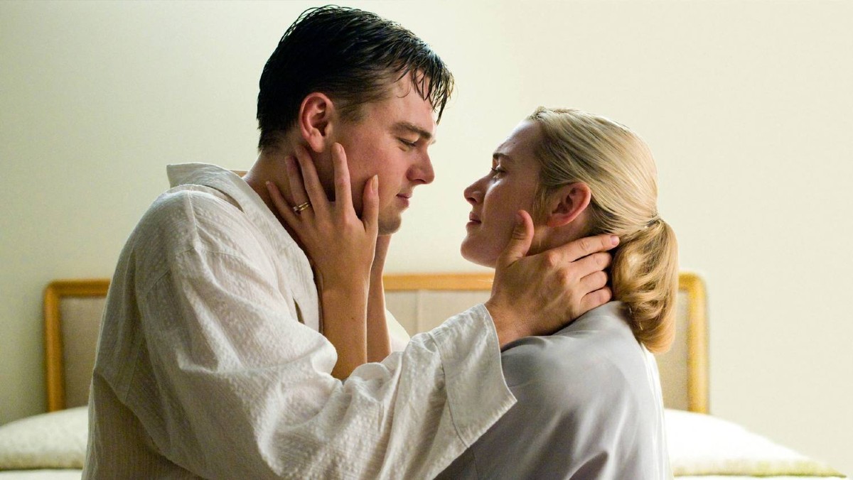 Leonardo DiCaprio and Kate Winslet hold each other's faces in a scene from Revolutionary Road.