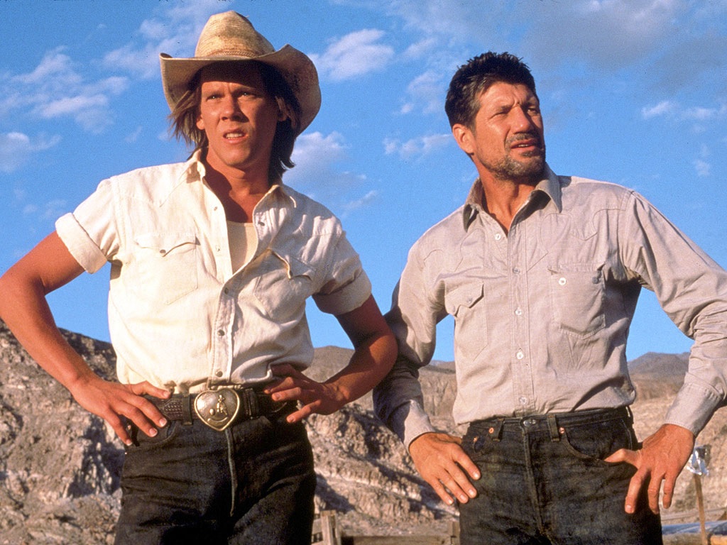 Kevin Bacon and Fred Ward in Tremors.