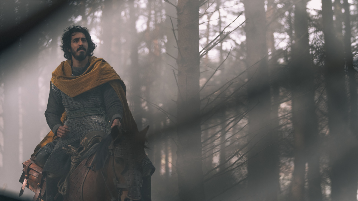 Dev Patel riding a horse in the Green Knight