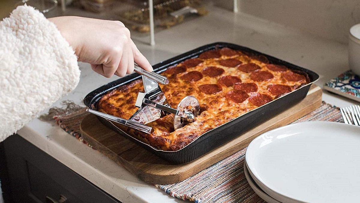 This Discovery pizza cutter slices through pepperonis like phaser fire.