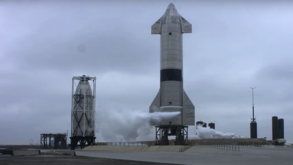 The SN15 Starship from SpaceX sits on its launchpad as smoke begins to come out of the bottom