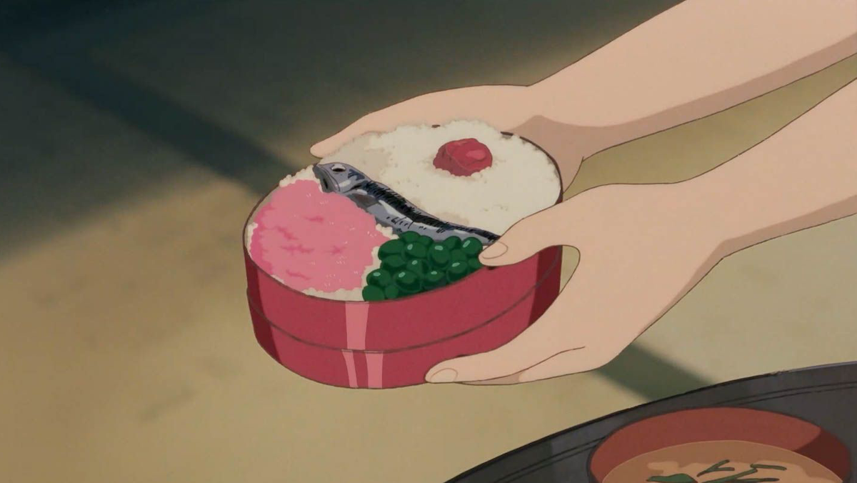 An animated bowl of rice and fish.