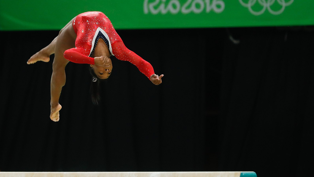 Olympic athlete Simone Biles performing one of her gymnastics routines in 2016.