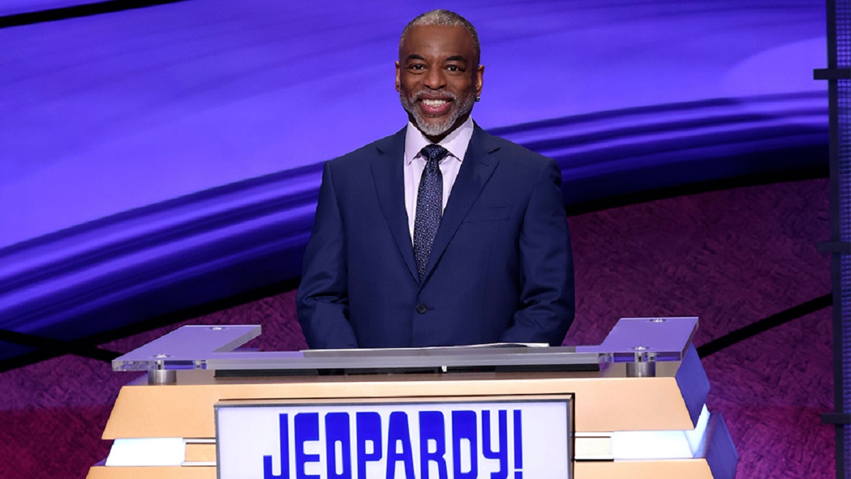 Levar Burton smiles behind the podium during his guest hosting stint on Jeopardy!