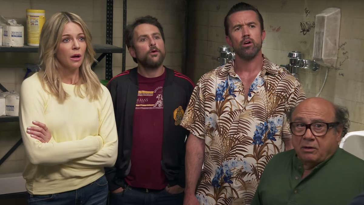 Dee, Charlie, Mac, and Frank listen to Dennis talk in the bathroom from season 15 of It's Always Sunny in Philadelphia 