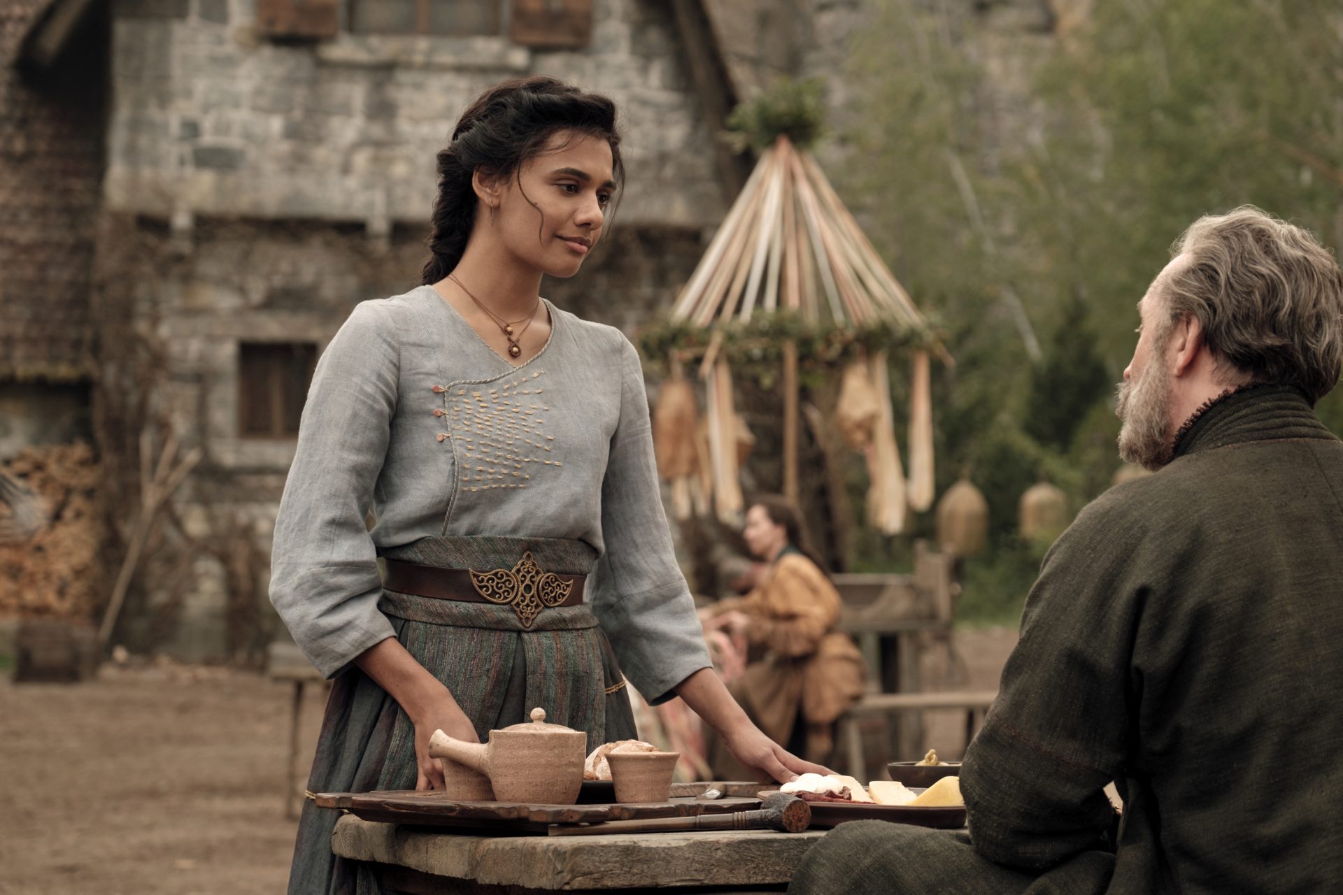 Egwene serving refreshments in The Wheel of Time