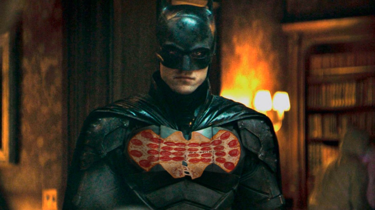 Robert Pattinson as The Batman with the Little Caesars The Batman Calzony for his chest emblem