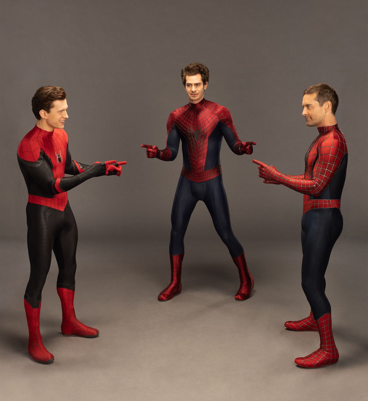 Tom Holland, Andrew Garfield, and Tobey Maguire recreate the Spider-Mans pointing meme for the Spider-Man fake butt article.