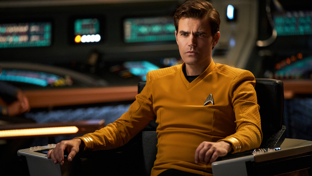 Paul Wesley sits in the captain's chair as James T. Kirk in Star Trek: Strange New Worlds