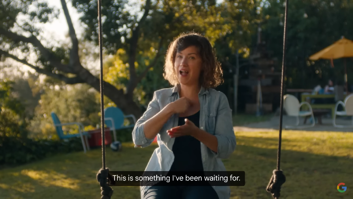 A woman uses ASL during an interview about the Google AR headset