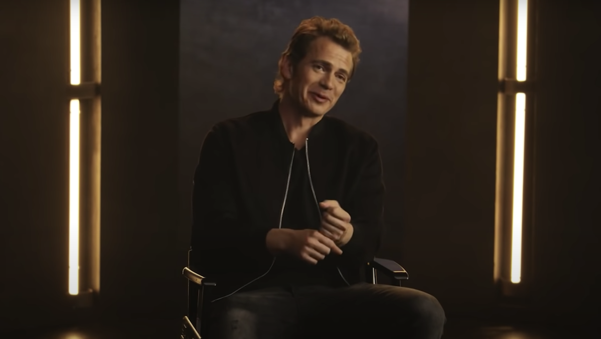 Hayden Christensen holds his hands like they're lightsabers