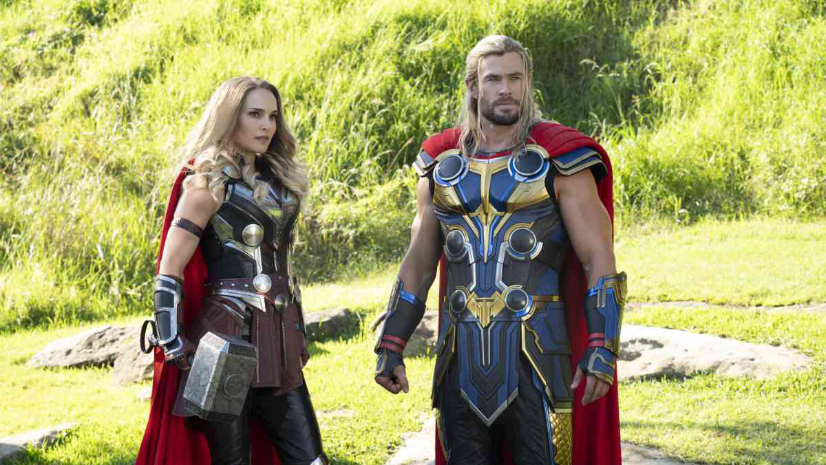 A still from the MCU movie Thor: Love and Thunder shows Jane Foster Mighty Thor standing next to Odinson Thor