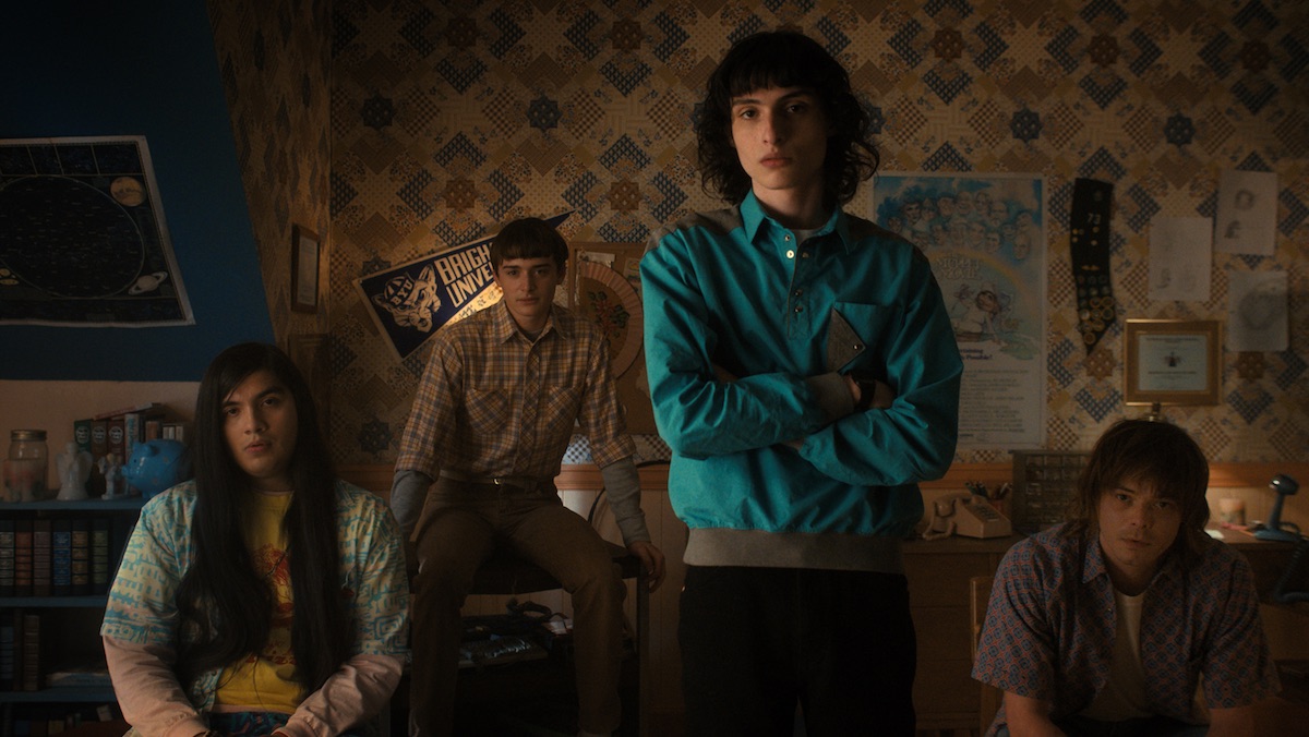 (L to R) Eduardo Franco as Argyle, Noah Schnapp as Will Byers, Finn Wolfhard as Mike Wheeler, and Charlie Heaton as Jonathan in STRANGER THINGS 4