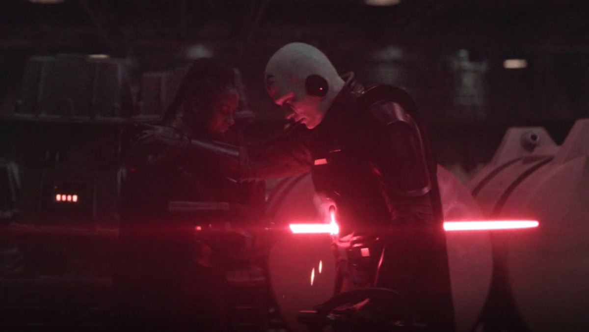 Reva stabs the Grand Inquisitor with a red lightsaber on Obi-Wan Kenobi