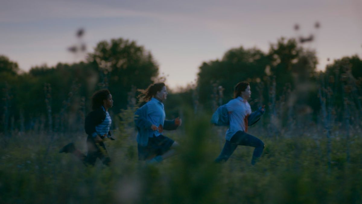 girls running across a field paper girls tv show