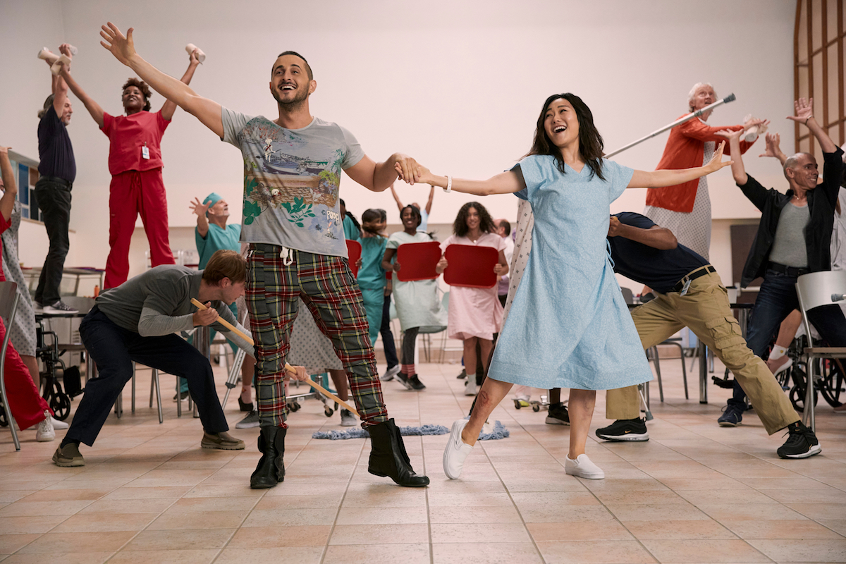 Frenchie and Kimiko singing and dancing during The Boys big musical number