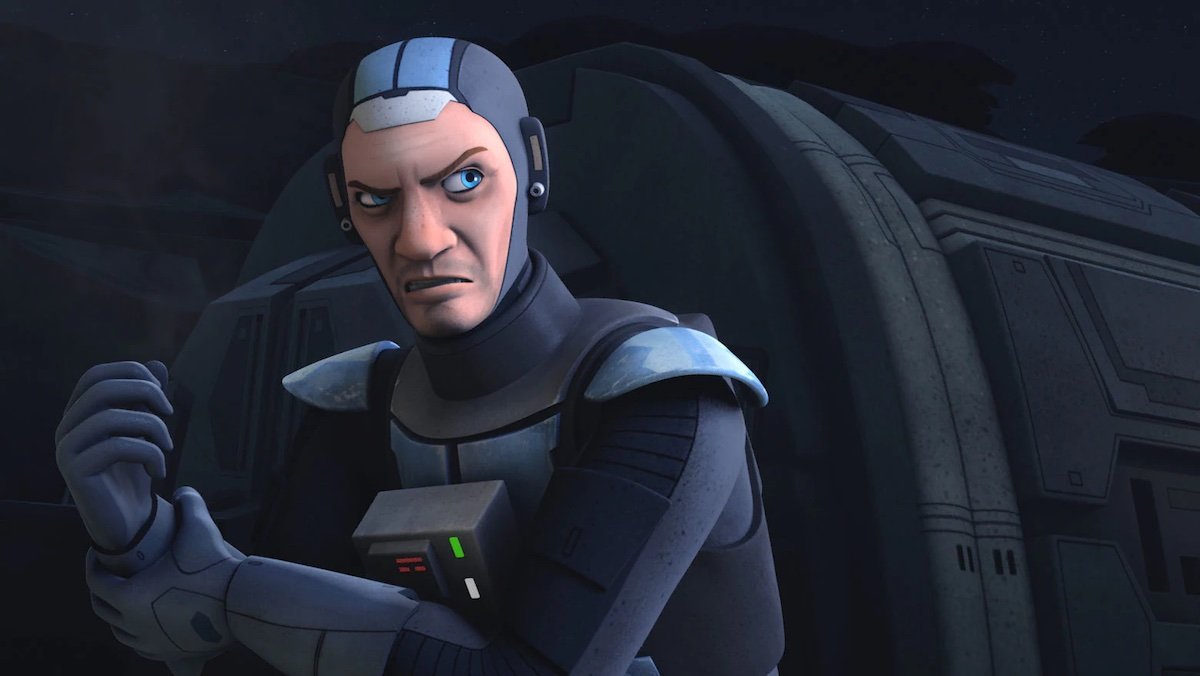 Fenn Rau without his helmet pulls his glvoe tight on Star Wars Rebels