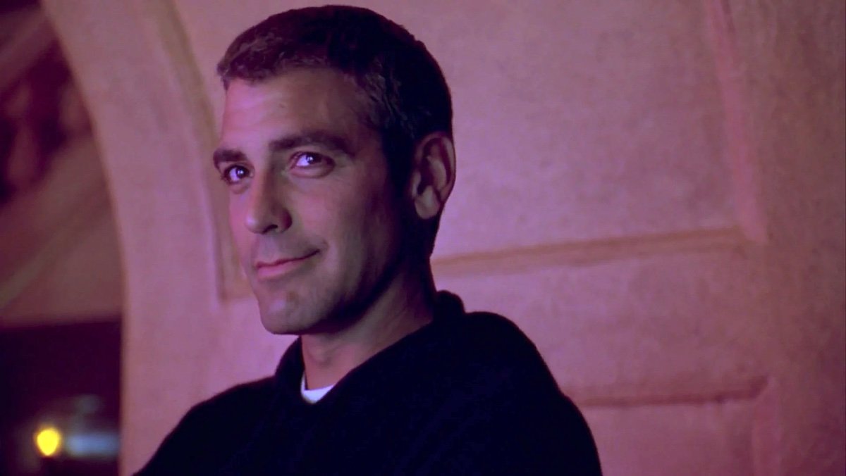 George Clooney smiles as Bruce Wayne in Batman & Robin