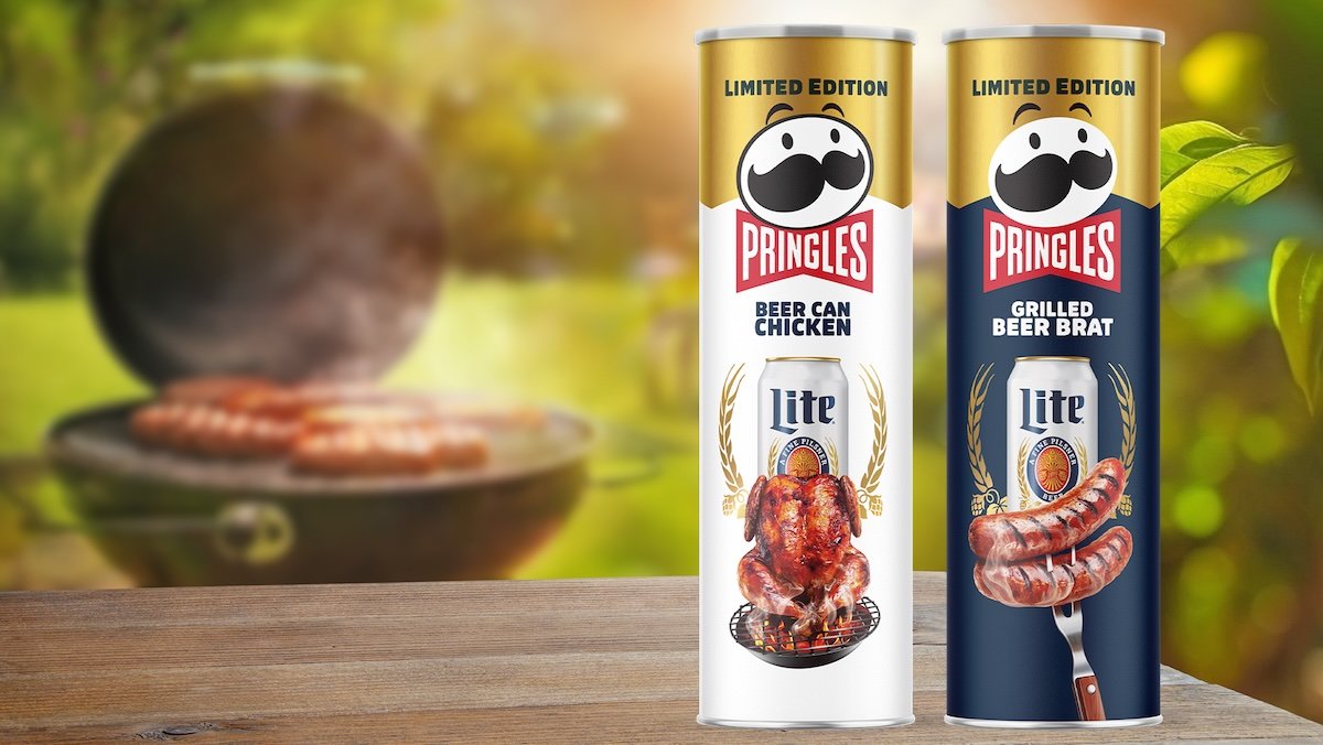 Two cans of Pringles Miller Lite flavors with a grill cooking sausages in the background