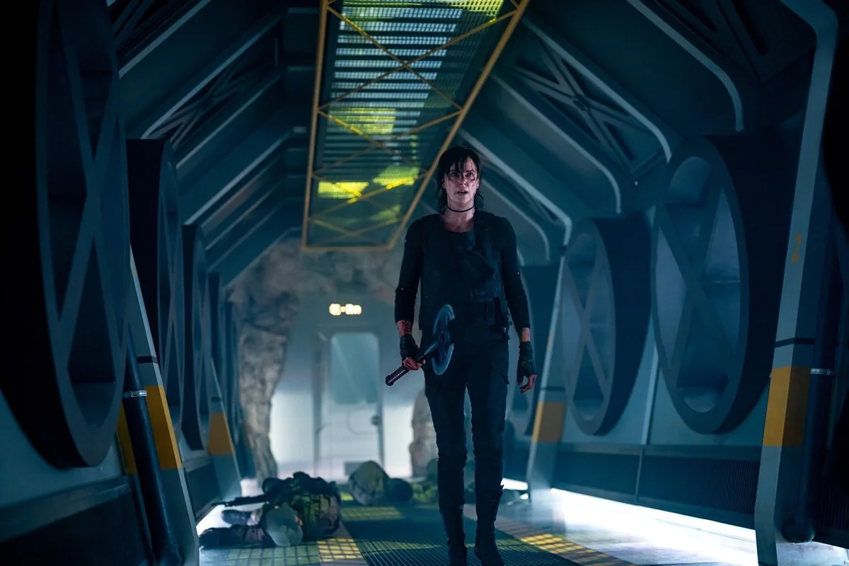Charlize Theron after a fierce battle in The Old Guard 2.