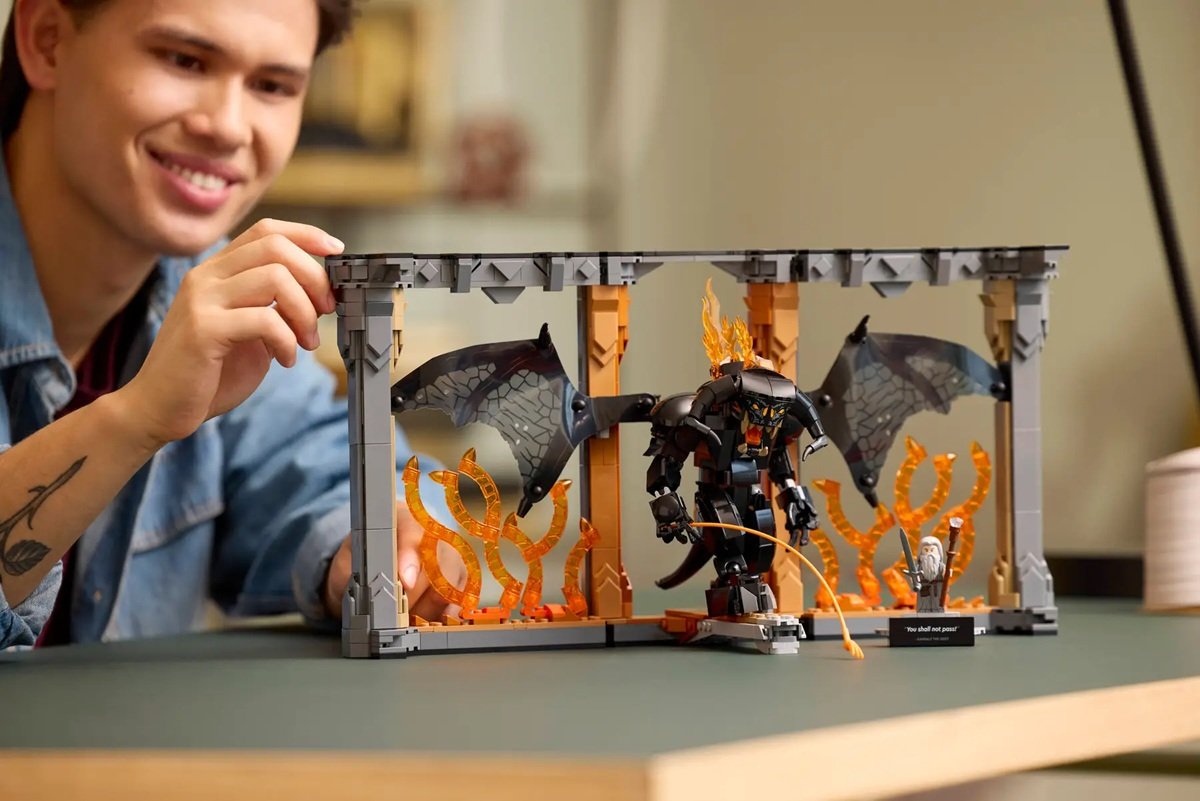 The LEGO Ideas Lord of the Rings Balrog set with owner.