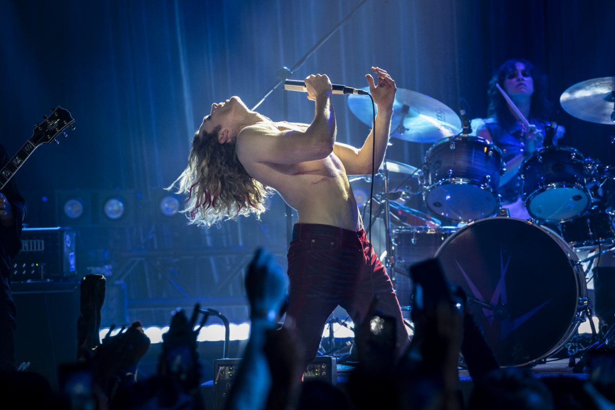The Vampire Lestat rocking out shirtless on stage