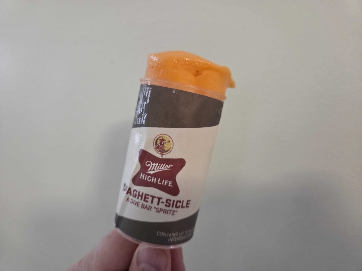 An orange opened Miller High Life Spaghett-sicle pops