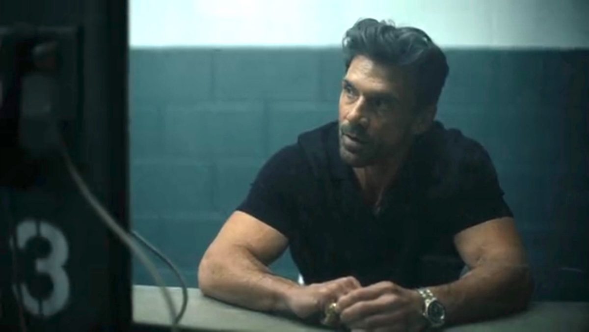 Frank Grillo as Rick Flagg Sr waits at a jail cell phone on peacemaker