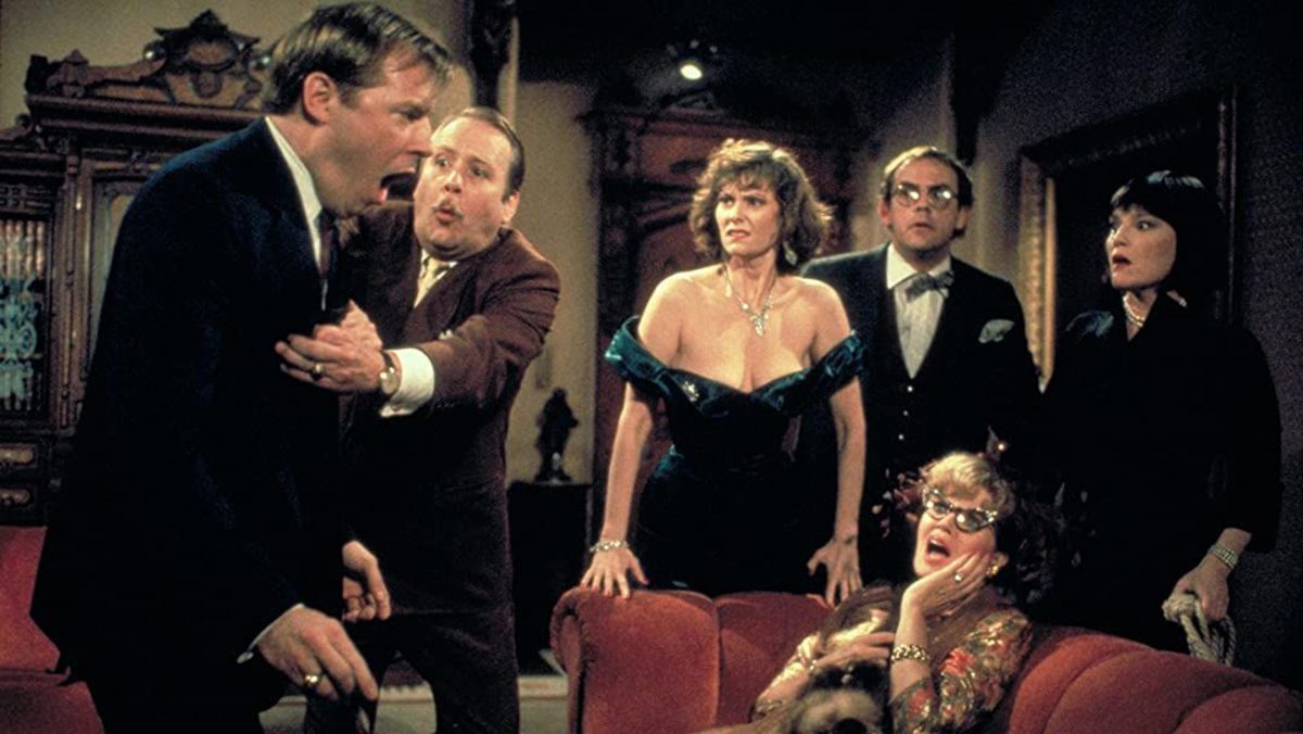 cast of clue gathers around living room